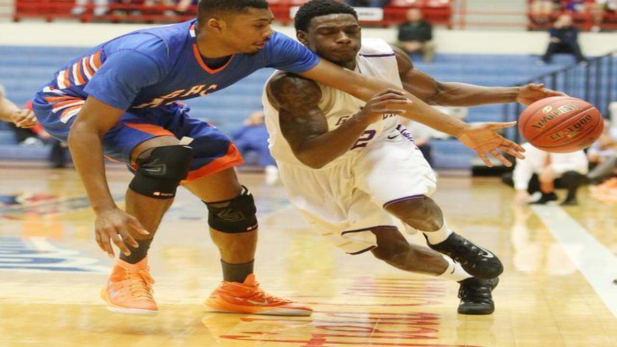 
Gerogia Highland's Terrence Thompson fouls Butler's Jacolby Jones in the second half Tuesday at the NJCAA Tournament in Hutchinson.
