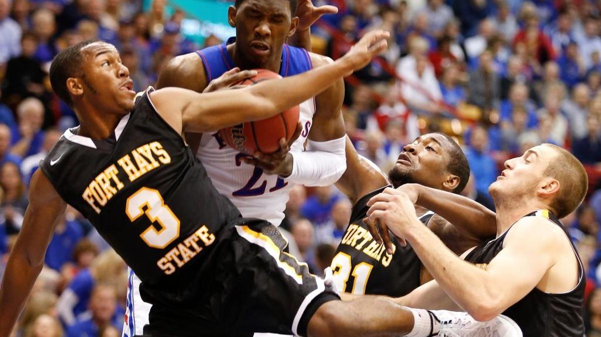 Fort Hays State point guard Craig Nicholson (3) has set the Tigers’ single-season assists record twice in his career.