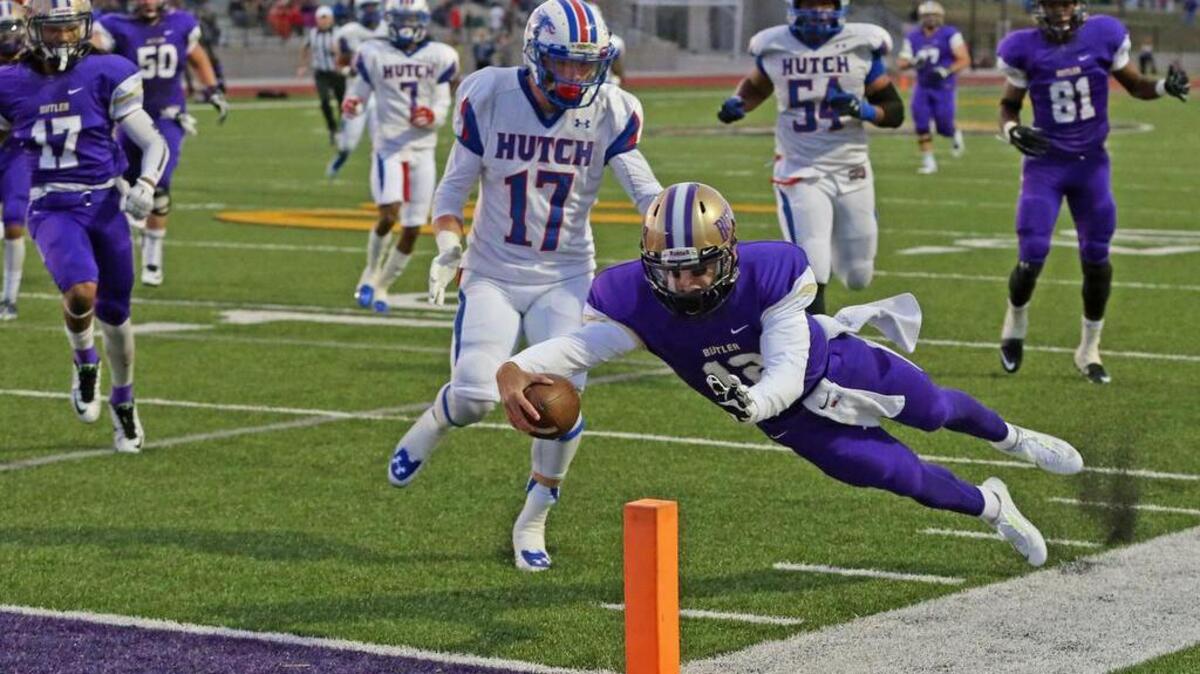 
Joel Blumenthal (12) barely steps out of bounds before he leaps for the end zone giving Butler the ball at the 3-yard line against Hutchinson last September. Hutchinson won the Jayhawk Conference championship.
