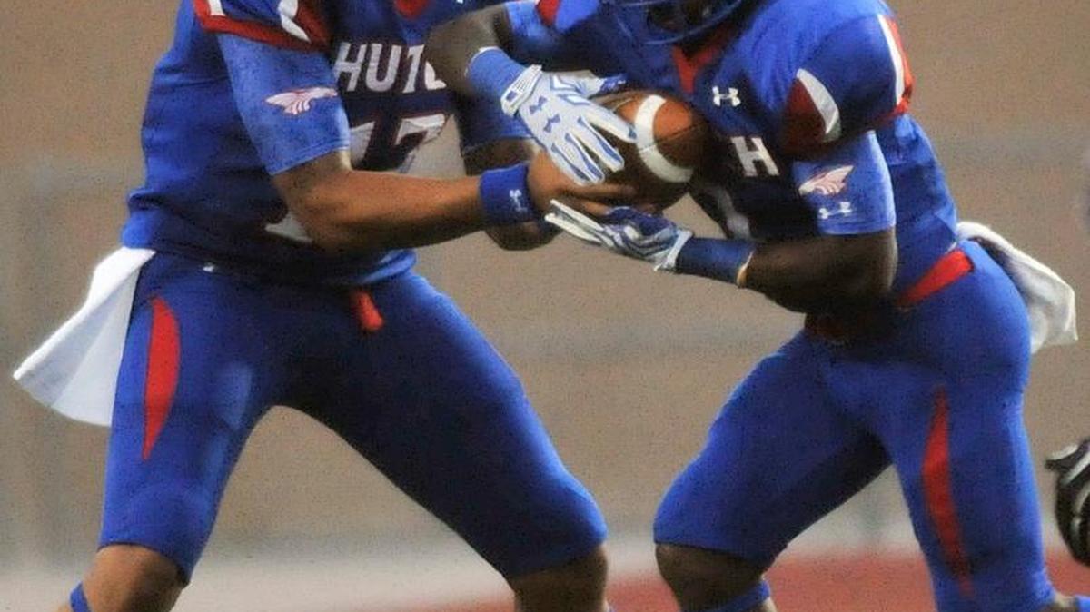 
Hutchinson Community College quarterback Kylen Binn, left, was 7 of 15 for 126 yards in the Blue Dragons’ victory last week.
