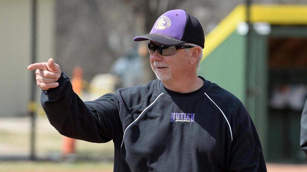 Butler Community College softball coach Doug Chance during a game last season in El Dorado. Six Butler softball players were hospitalized with a skeletal muscle condition last week, and three remain in the hospital.