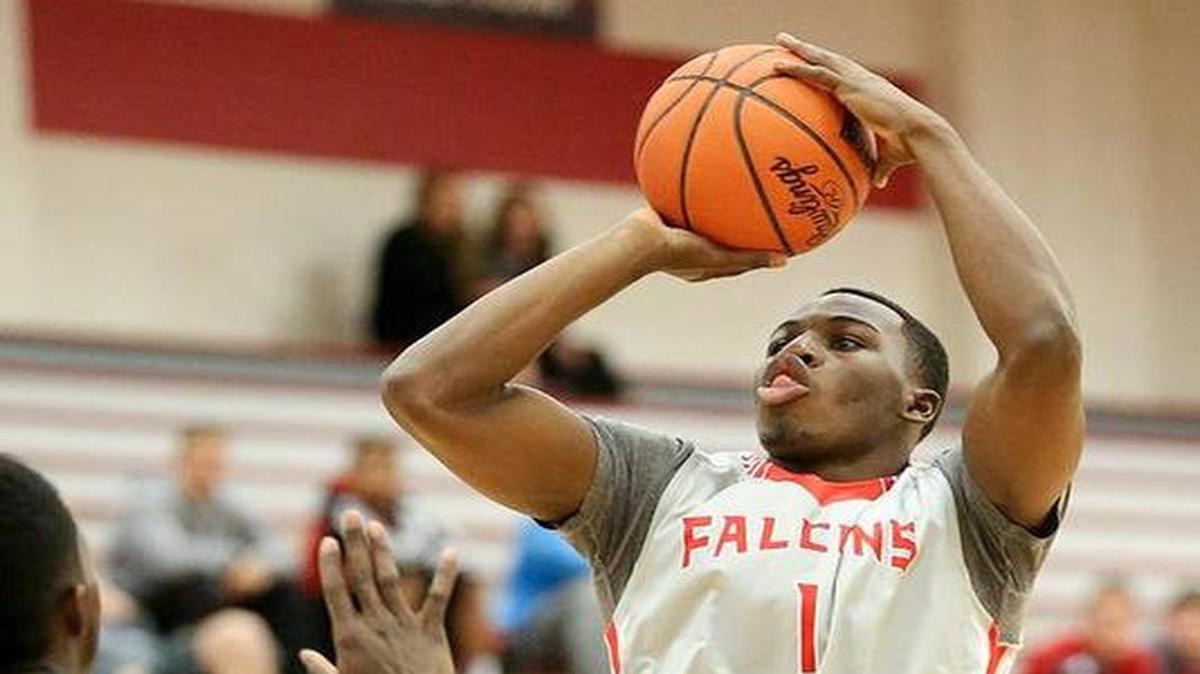 Friends guard Joe Mitchell goes up for a shot during the 2013-2014 season. Mitchell was the NAIA Division II National Player of the Year in 2014 and led the Falcons to the NAIA Division II quarterfinals.