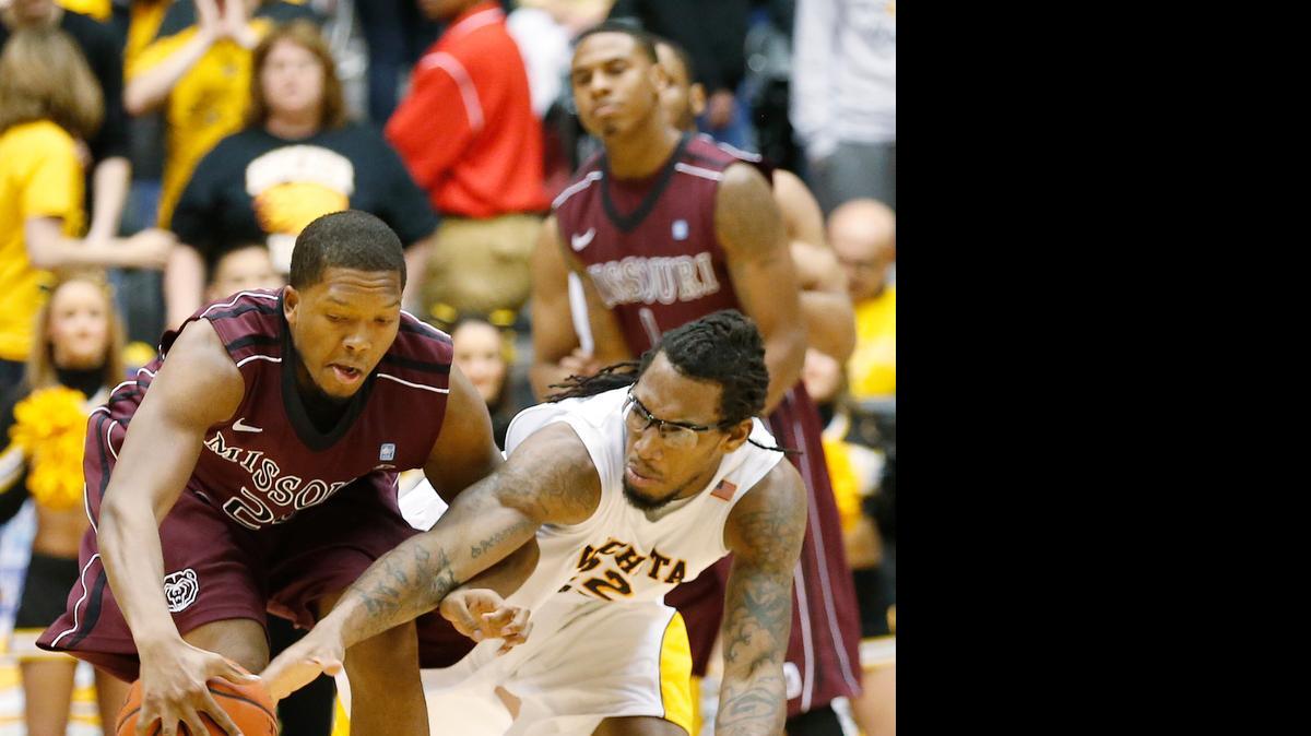 
Missouri State's Gavin Thurman, left, battles with Wichita State’s Carl Hall at Koch Arena in 2013. Thurman, a Wichita native, will play for Newman in the fall. 
