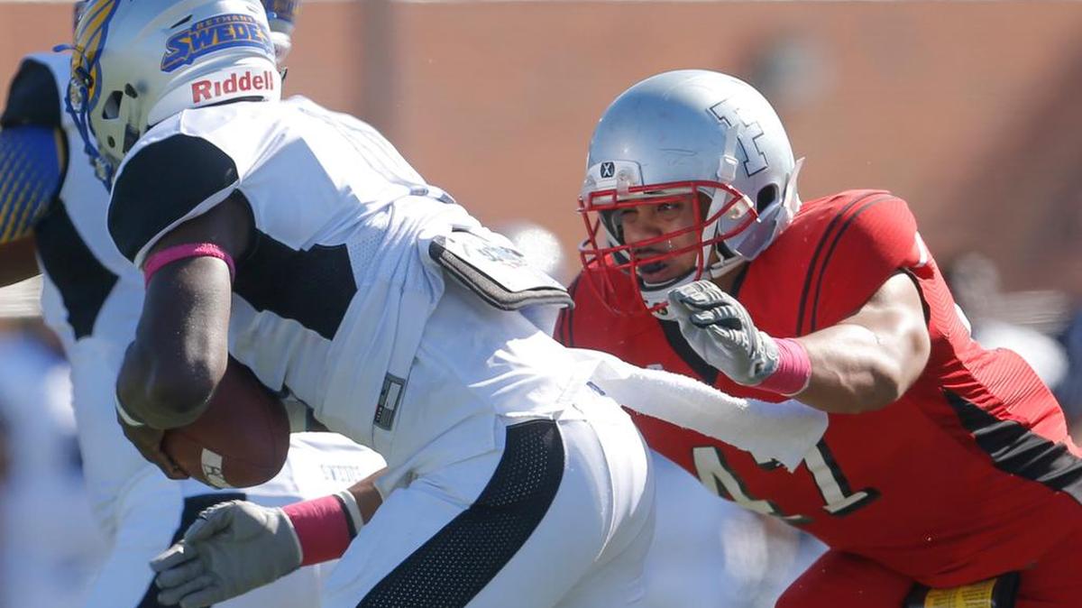 
Friends linebacker Moses Tili sacks Bethany quarterback Virgil Bridges last season at Adair-Austin Stadium.
