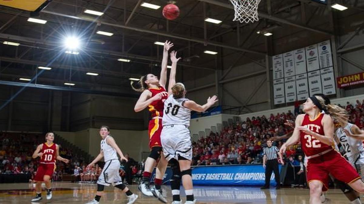 Carroll graduate Cathy Brugman (shooting) averages 13.6 points and 4.5 rebounds for Pittsburg State.