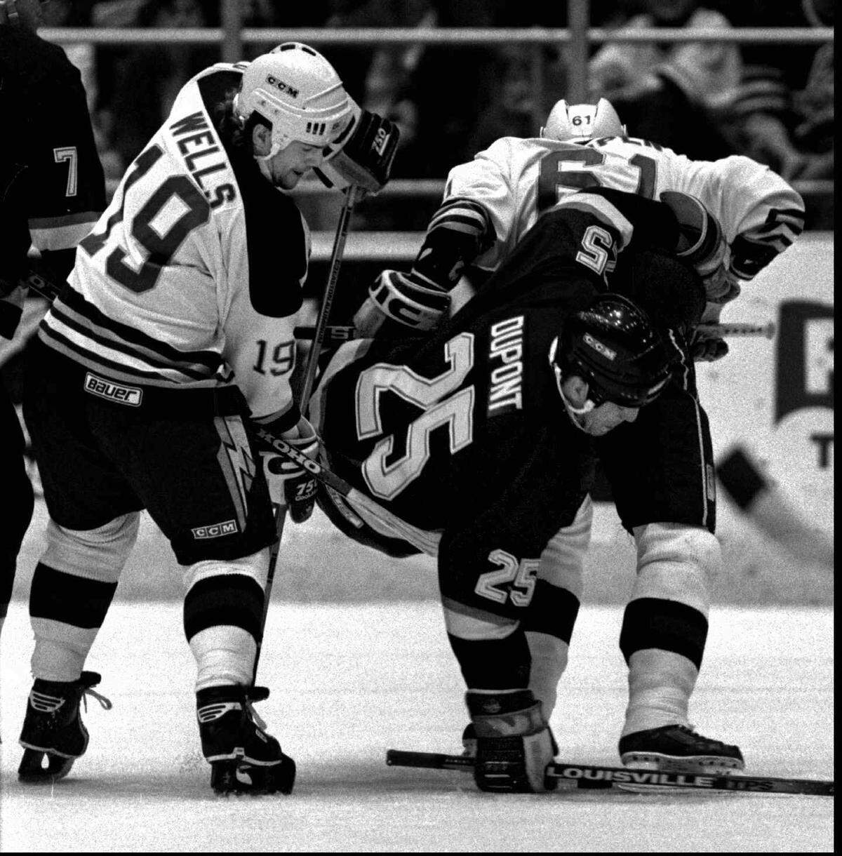 At their peak, the Wichita Thunder were known as the bullies of the Central Hockey League, thanks to physical play like this from Brian Wells and Mark Karpen.