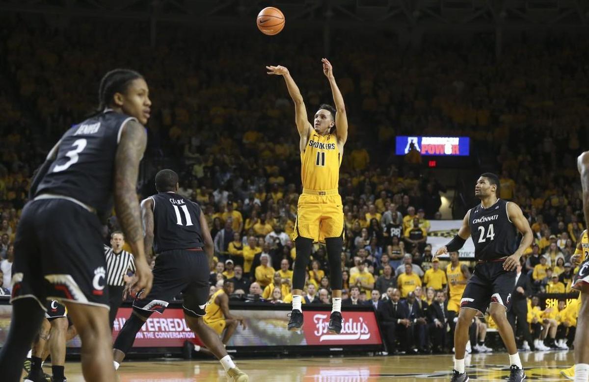 Wichita State guard Landry Shamet hits a three-pointer against Cincinnati at Koch Arena.