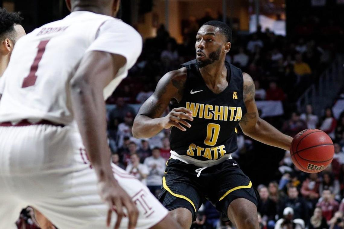 Wichita State’s Rashard Kelly looks for a teammate against Temple last week in Philadelphia.