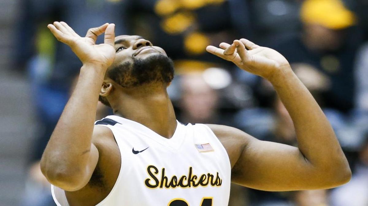 Wichita State center Shaq Morris celebrates his three-pointer against Southern Illinois during the second half Tuesday at Koch Arena.
