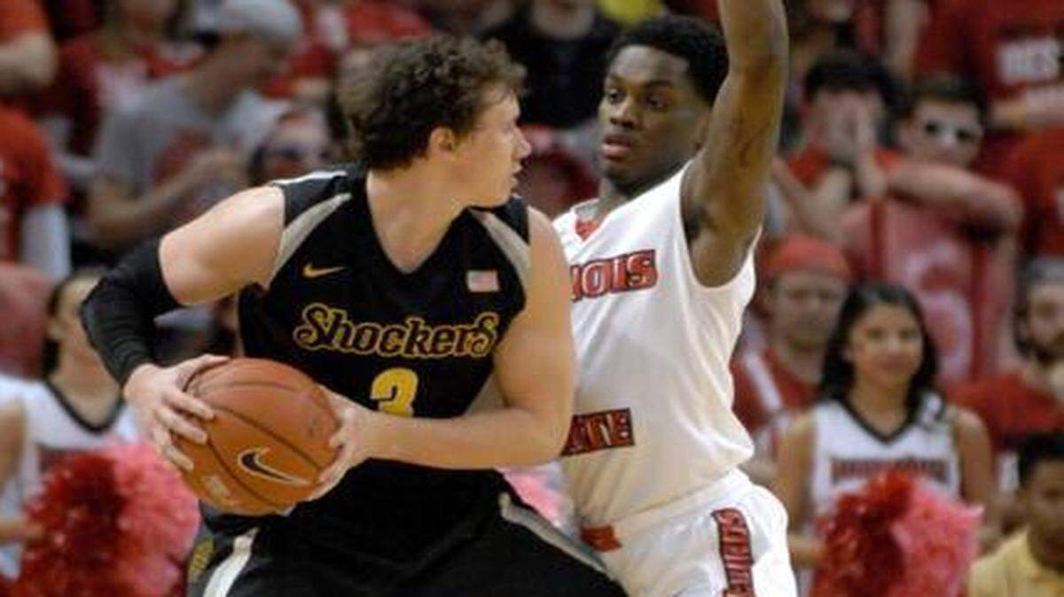 
Wichita State's Evan Wessel is guarded by Illinois State’s Paris Lee on Saturday.
