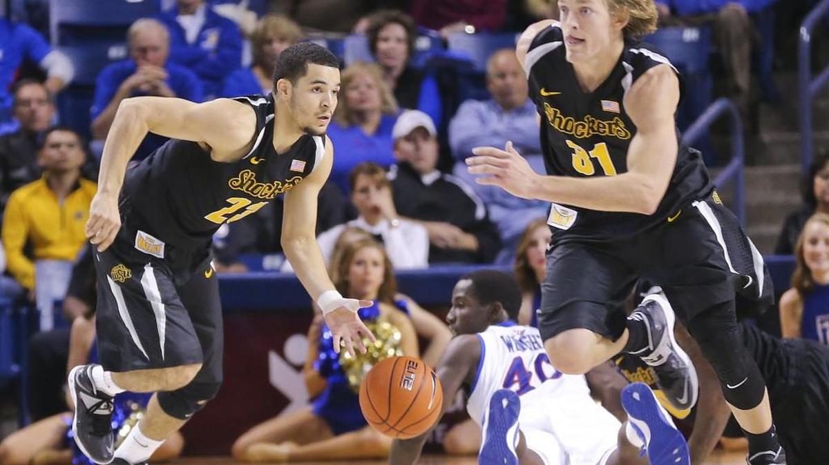 Fred Van Vleet, left, and Ron Baker will enter the Wichita Sports Hall of Fame at a May 7 induction ceremony.