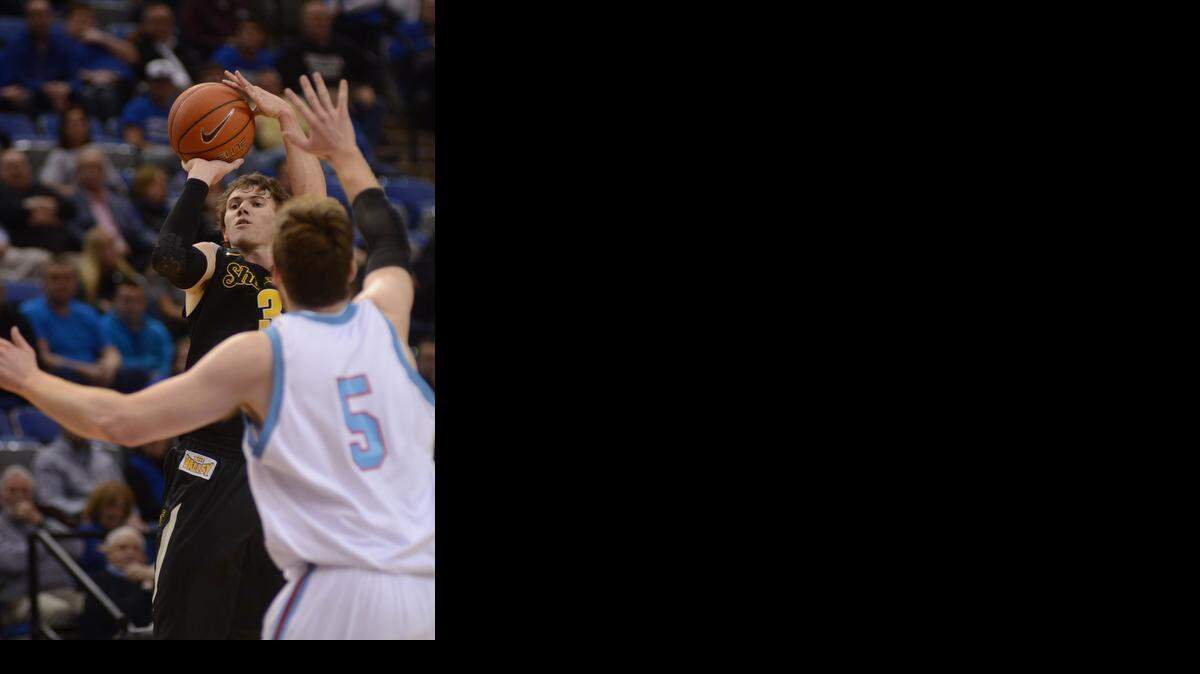 
Wichita State's Evan Wessel shoots a three-pointer over Indiana State's Justin Gant in the first half Wednesday in Terre Haute, Ind. 

