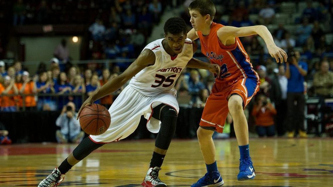 Cedar Ridge’s Austin Reaves, right, has given Wichita State a non-binding commitment.