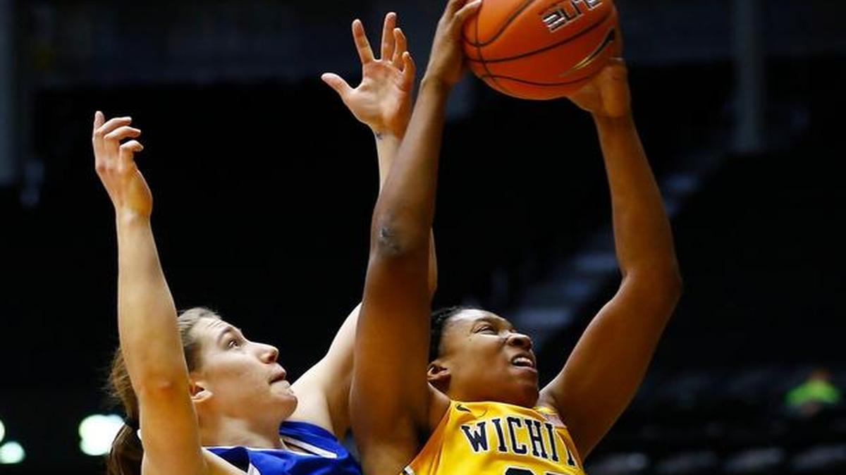 Wichita State’s Rangie Bessard scores against Drake’s Sara Rhine last season at Koch Arena.