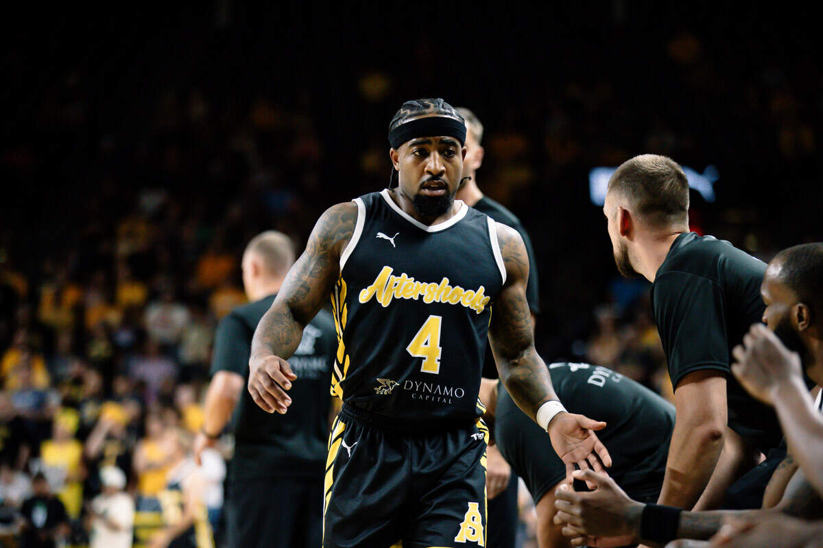 AfterShocks star Marcus Keene is shown in the jersey that features Dynamo Capital on the front.
