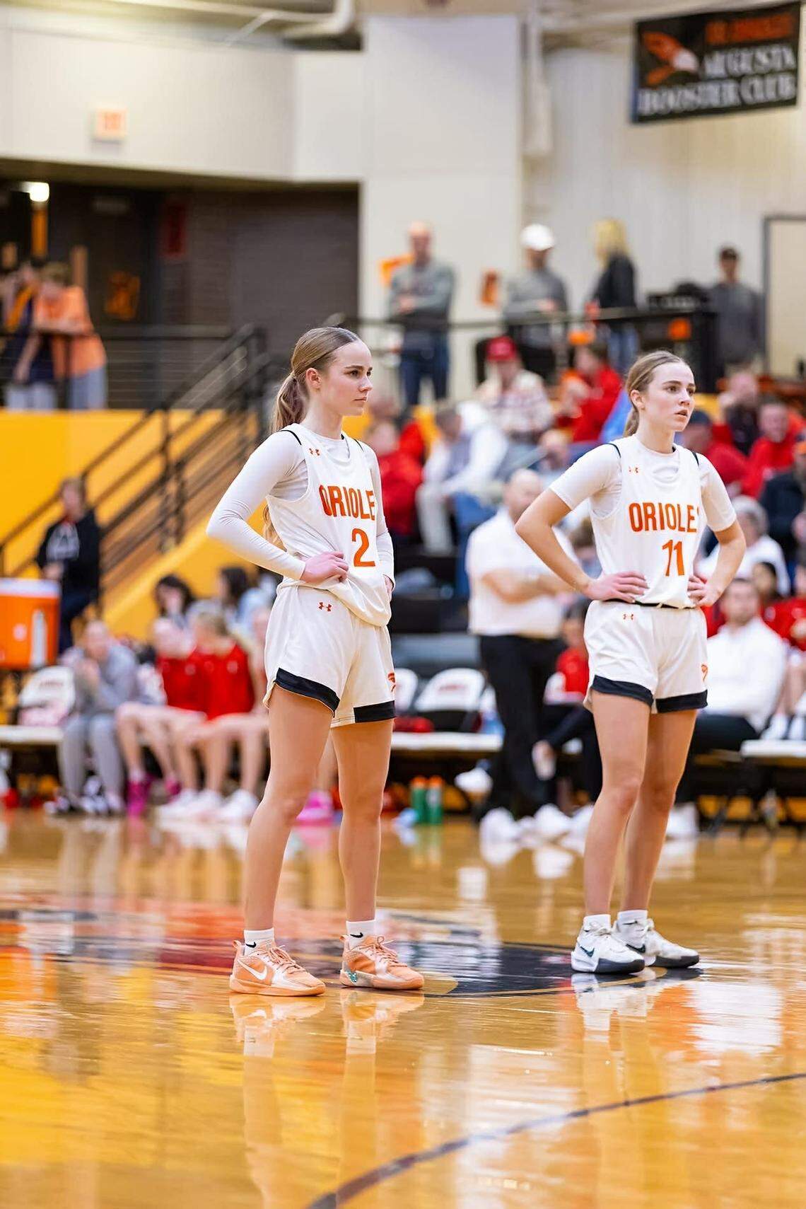 Ragan and Rylee Pfeifer, senior twins, play five different sports for Augusta during the high school season. On Tuesday night, their defense helped the Orioles girls basketball team spring a massive upset in the postseason.