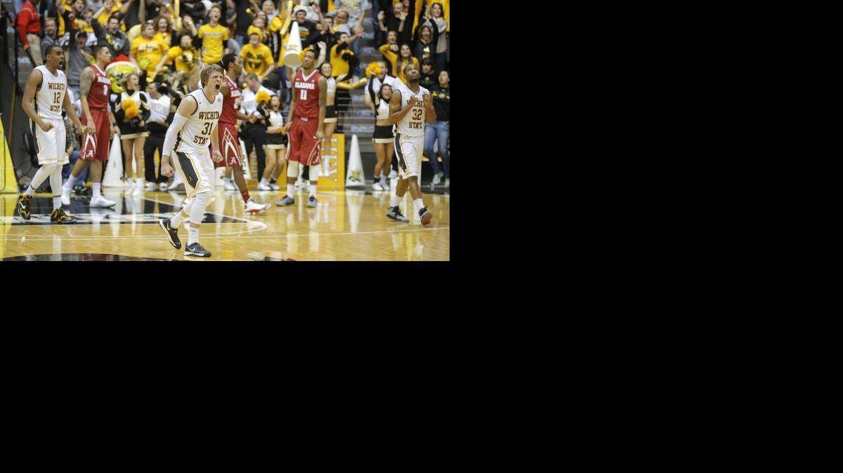 
Wichita State's Ron Baker and his teammates celebrate after beating Alabama 53-52 on Tuesday night at Koch Arena. 
