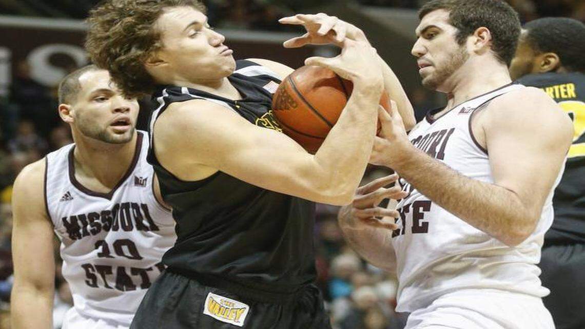 
Wichita State's Evan Wessel fights for a rebound with Missouri State's Tyler McCullough in the first half Wednesday at the JQH Arena in Springfield, Mo.
