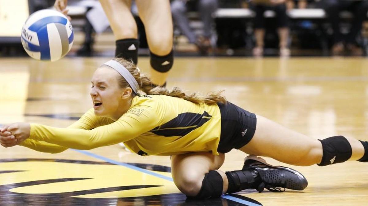 
Wichita State’s Dani Mostrom digs one out against Northern Illinois in the third set during the Shocker Volleyball Classic on Thursday at Koch Arena. The Shockers won in four sets.
