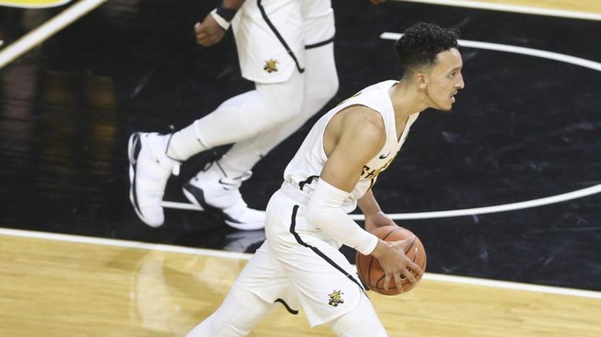 Wichita State guard Landry Shamet and teammate Shaq Morris bring the ball up the floor against Florida Gulf Coast last Friday at Koch Arena. The game marked the end of Wichita State's non-conference schedule. Next: Their journey through the American Conference.