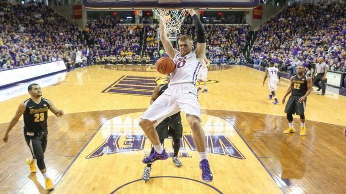 
Northern Iowa’s Seth Tuttle dunks against Wichita State during the first half Saturday in Cedar Falls, Iowa. Tuttle scored a career-high 29 points.
