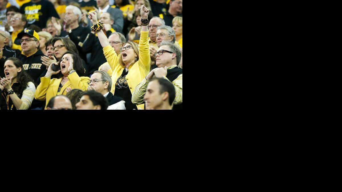 Wichita State fans cheer in the first half of the NCAA Tournament game against Indiana in Omaha on Friday.