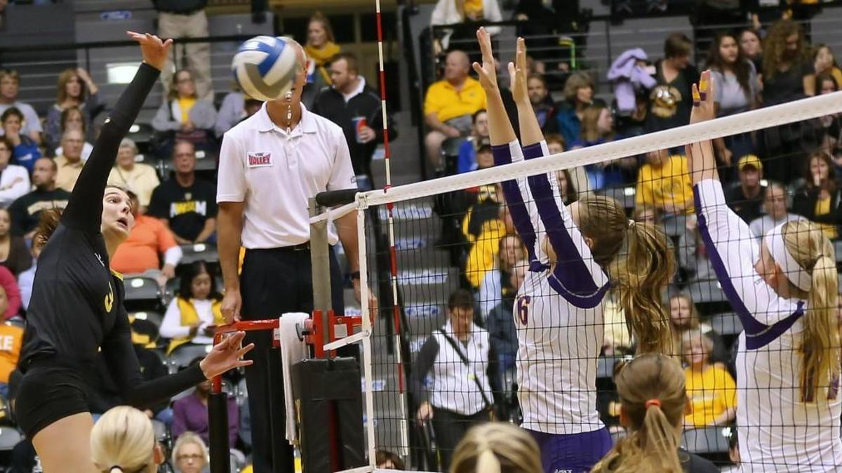 Mikaela Raudsepp spikes the ball during a match against Northern Iowa last season, The Shockers play host to UNI on Friday night at Koch Arena.