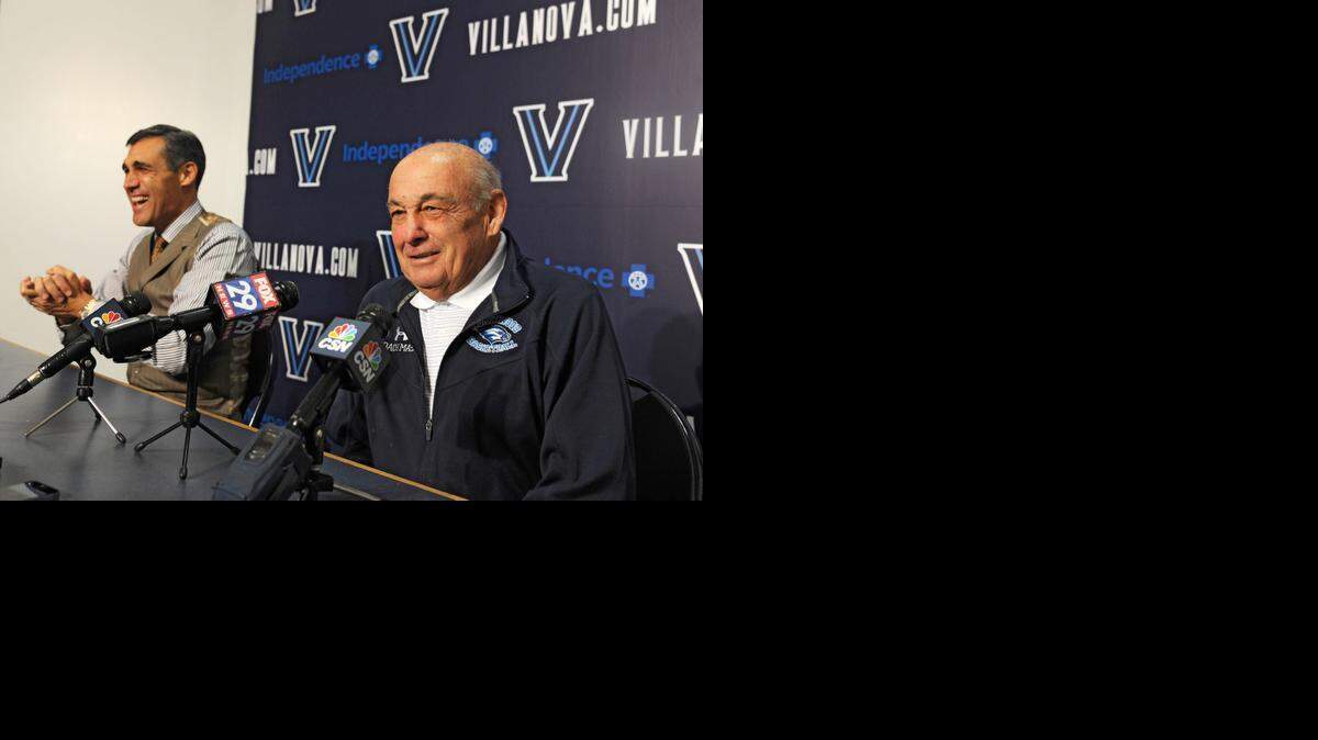 
Villanova basketball coach Jay Wright, left, cracks up as former Villanova coach Rollie Massimino tells a joke at a news conference prior to an exhibition game against Massimino's Northwood University team on Tuesday.
