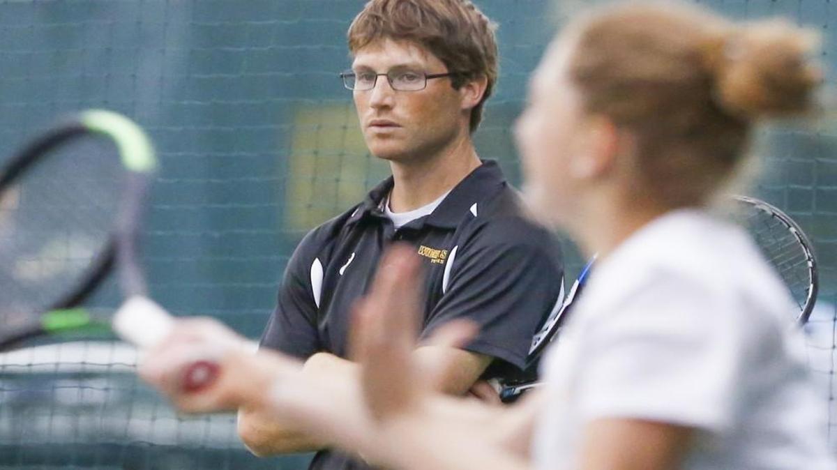 Wichita State women’s tennis coach Colin Foster gets his team ready for postseason play as they work out Wednesday at the Wichita Country Club.