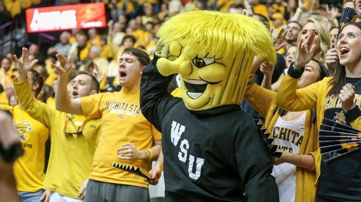 WuShock joins fans as they cheer on the Shockers during their game with Drake at Koch Arena on Saturday, Feb. 22, 2014.