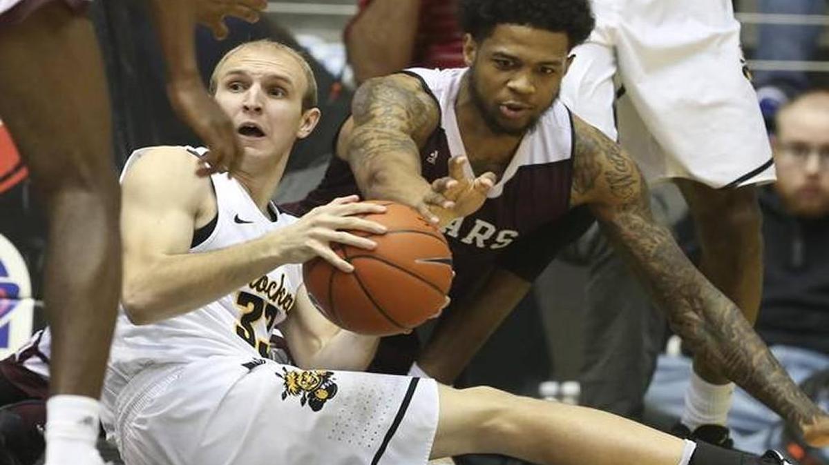 Conner Frankamp fights for a loose ball.