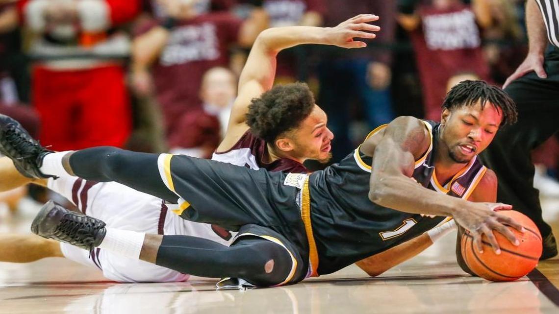 Zach Brown goes to the court for a loose ball during WSU’s game at Missouri State on Feb. 25.