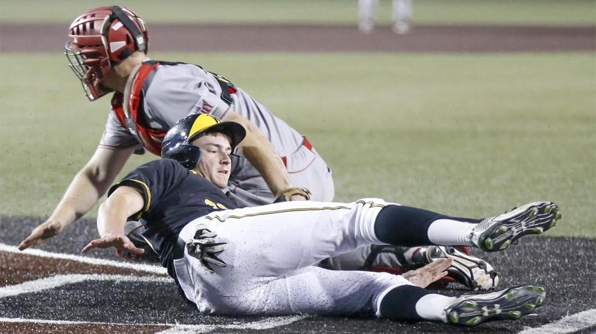Wichita State’s Luke Ritter scores the tying run in the seventh against Bradley catcher Ian Kristan on Friday at Eck Stadium.