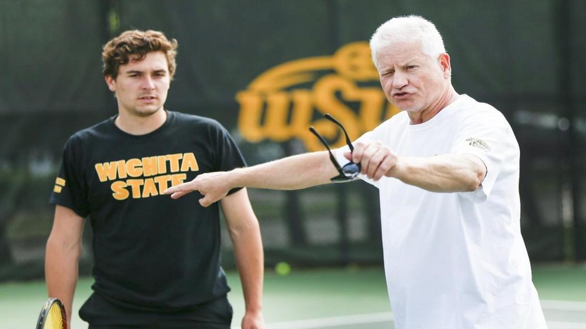 WSU tennis coach Brad Louderback gets Sergio de Vilchez, left, and his other players ready for the MVC Tournament on Thursday at the WSU tennis complex.
