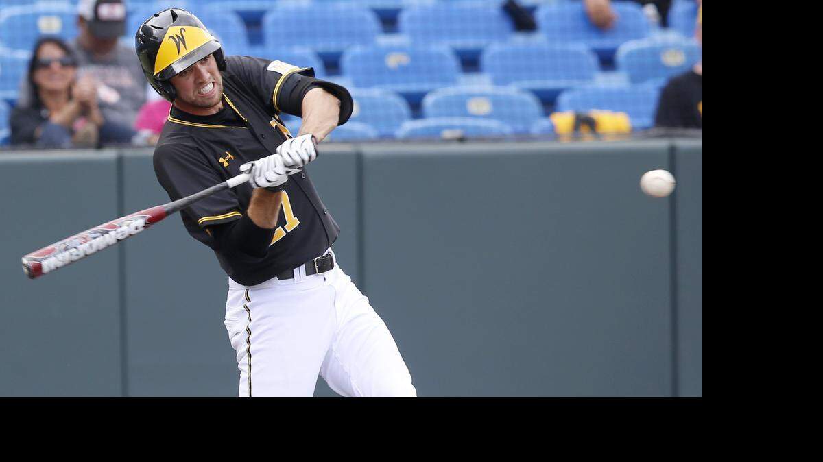 
Wichita State’s Ryan Tinkham hits the ball against Illinois State on Sunday.
