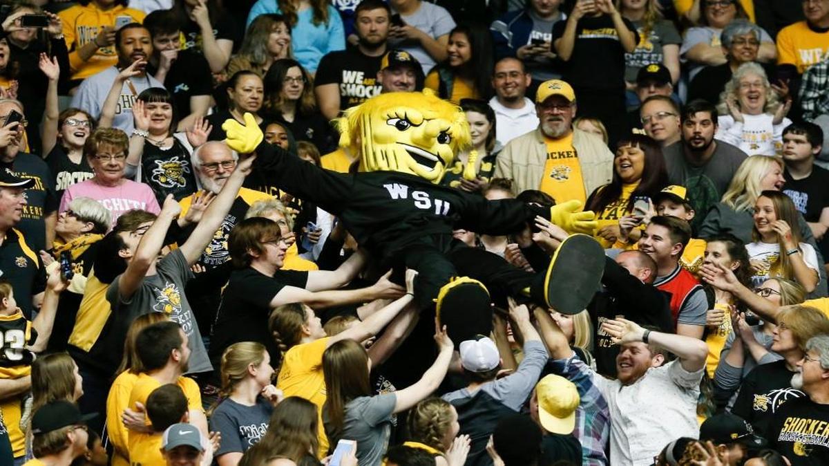 WuShock surfs the crowd during the final home game in February.