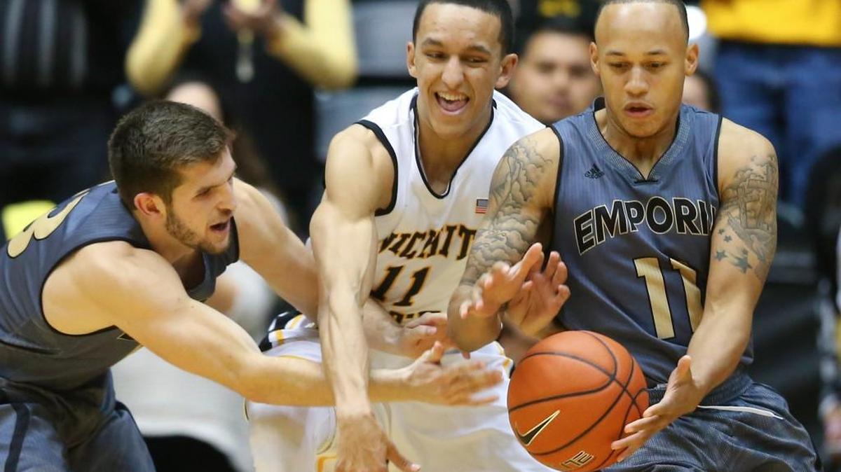 Injured Wichita State guard Landry Shamet, center, hopes to be cleared to walk without a protective boot this week. He’ll decide as he gets closer to playing shape whether to continue this season or take a medical redshirt.