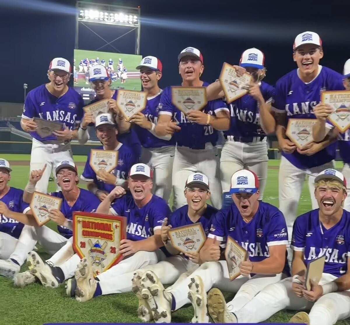 Team Kansas celebrates after defeating Florida 6-1 to win the High School Baseball National Championship Series on Sunday night at Charles Schwab Field in Omaha, Neb. The Kansas roster featured five Wichita-area players.