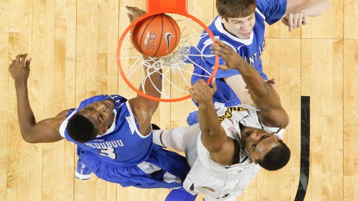 Wichita State’s Rashard Kelly, right, dunks against Saint Louis during the 2014-15 season. The Shockers and Billikens will play this season at Koch Arena.