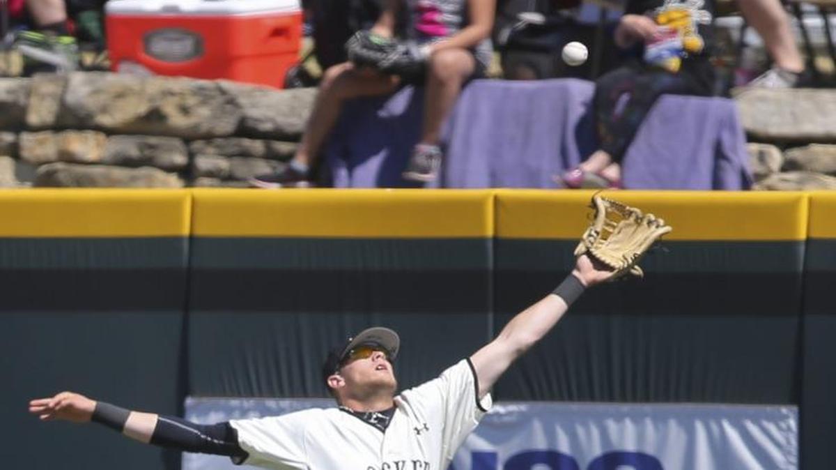 Wichita State’s Greyson Jenista can’t make a catch in right field Saturday at Eck Stadium.