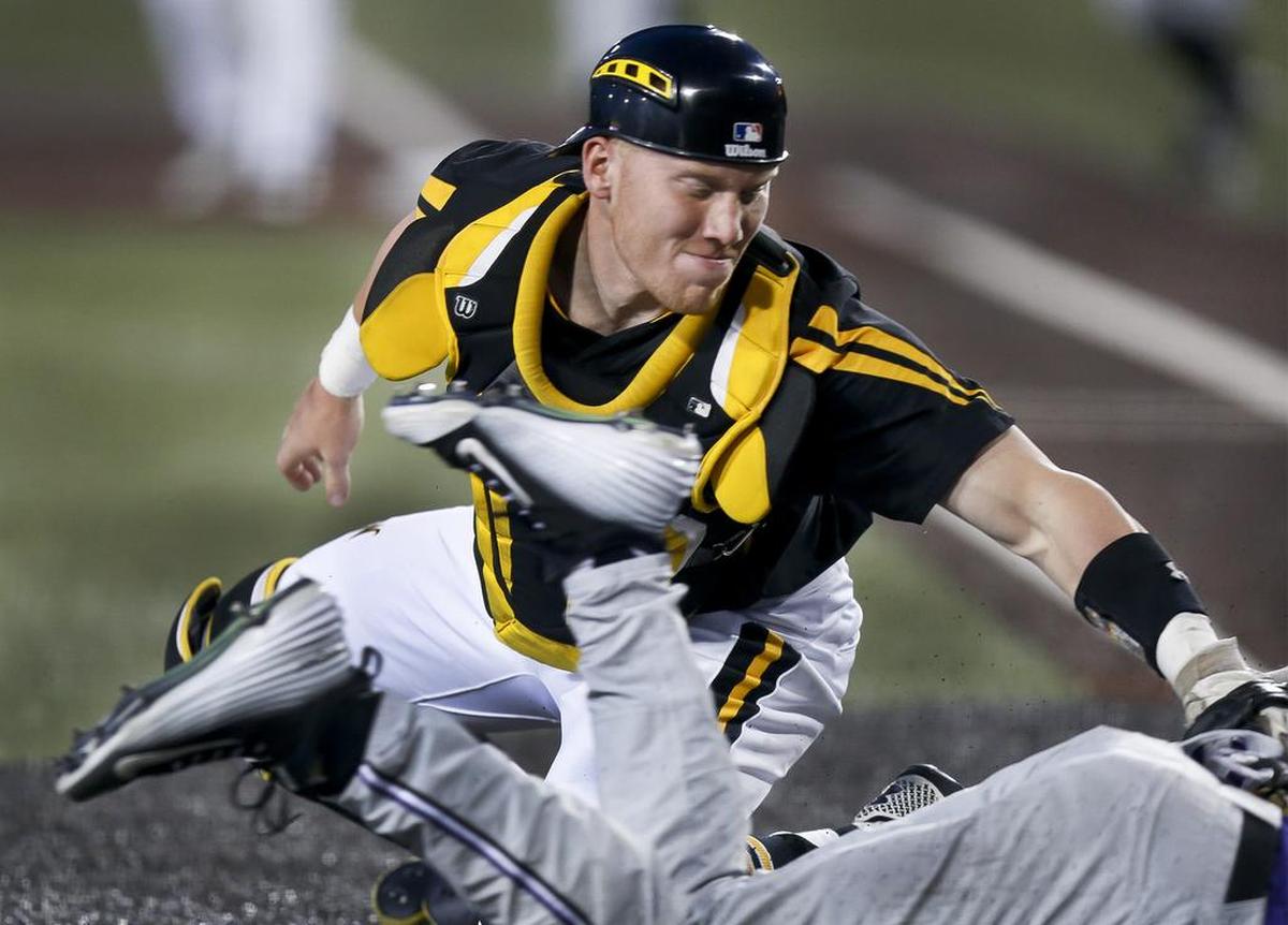 Wichita State catcher Gunnar Troutwine tags out Kansas State's Clayton Dalrymple at the plate in the 7th inning at Eck Stadium Wednesday. Kansas State won 5-2. (May 4, 2016)
