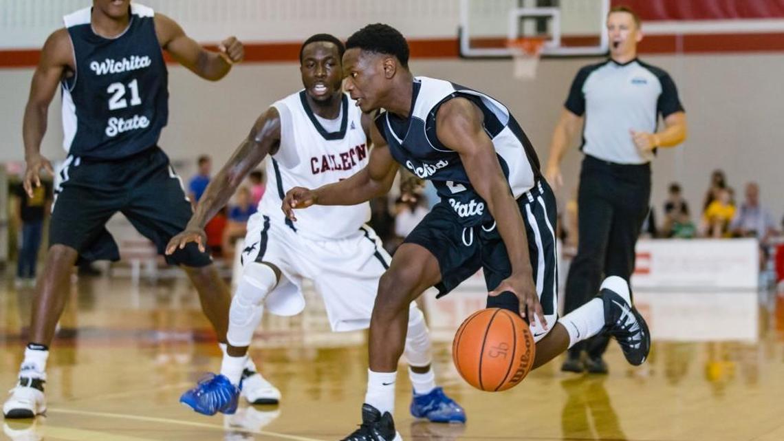 Wichita State junior guard Daishon Smith dribbles toward the basket during Sunday’s 100-75 loss to Carleton University in Ottawa.
