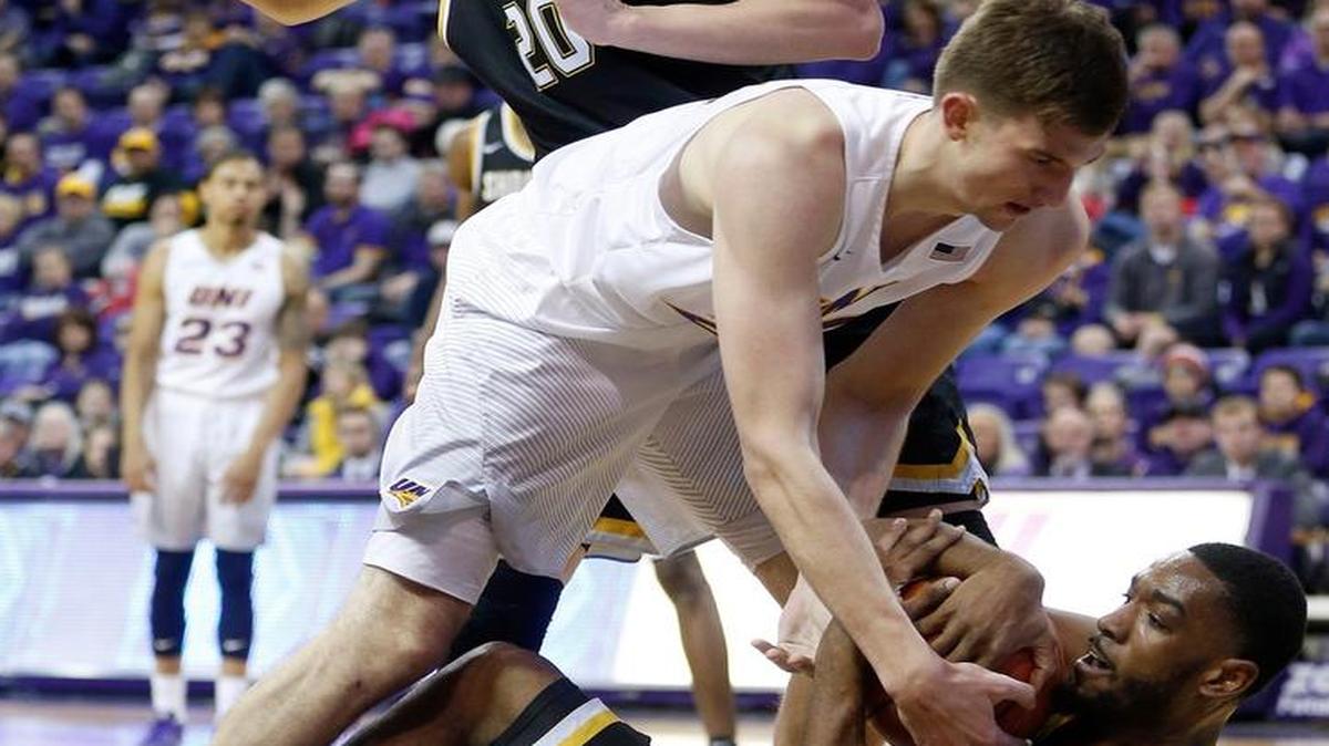 Northern Iowa's Bennett Koch battles Wichita State's Rashard Kelly during the second half Sunday in Cedar Falls, Iowa. Wichita State knocked UNI to 0-4 in the conference.