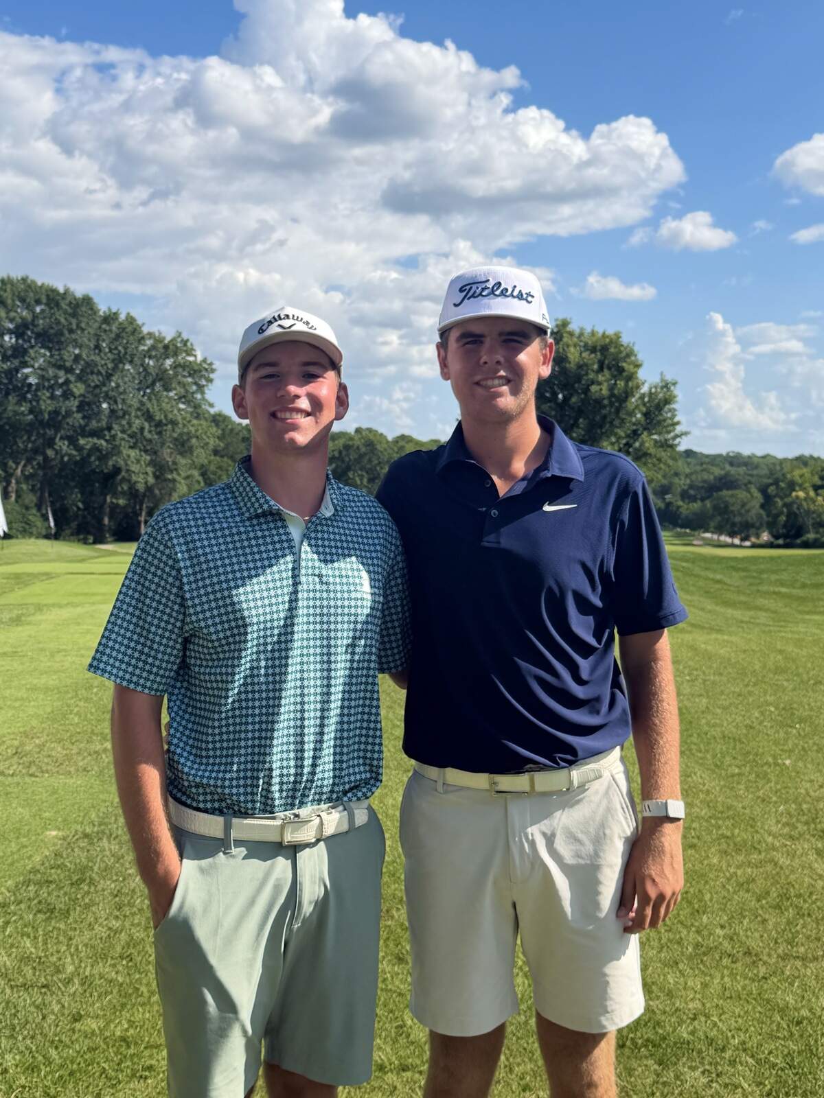 Kaden Leivian, left, and Charlie Haney pose for a photo after winning their semifinal matches Saturday and advancing to Sunday’s 36-hole Kansas Amateur final at Mission Hills Country Club.