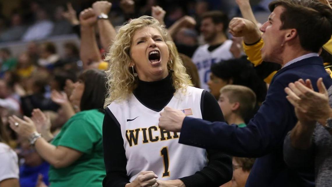 Lynn Marshall, wife of Wichita State coach Gregg Marshall, yells after a Shocker basket during Friday’s first-round victory over Dayton in Indianpolis.
