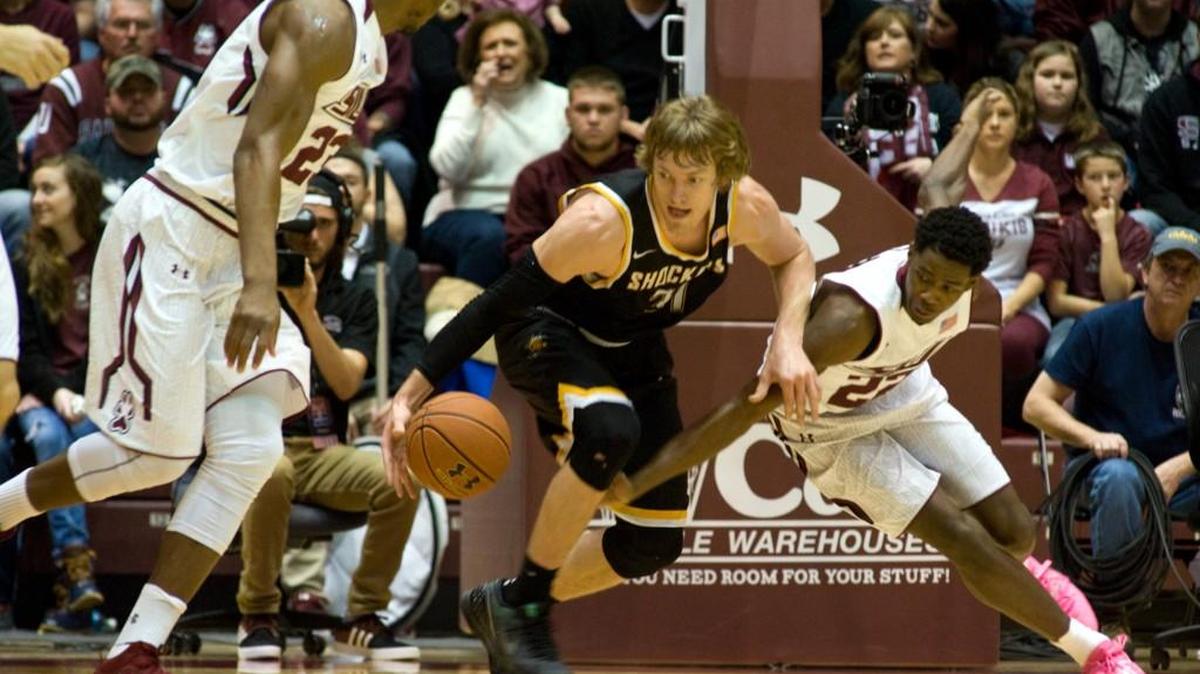 Shocker guard Ron Baker steals the ball from SIU’s Armon Fletcher during the first half Saturday.