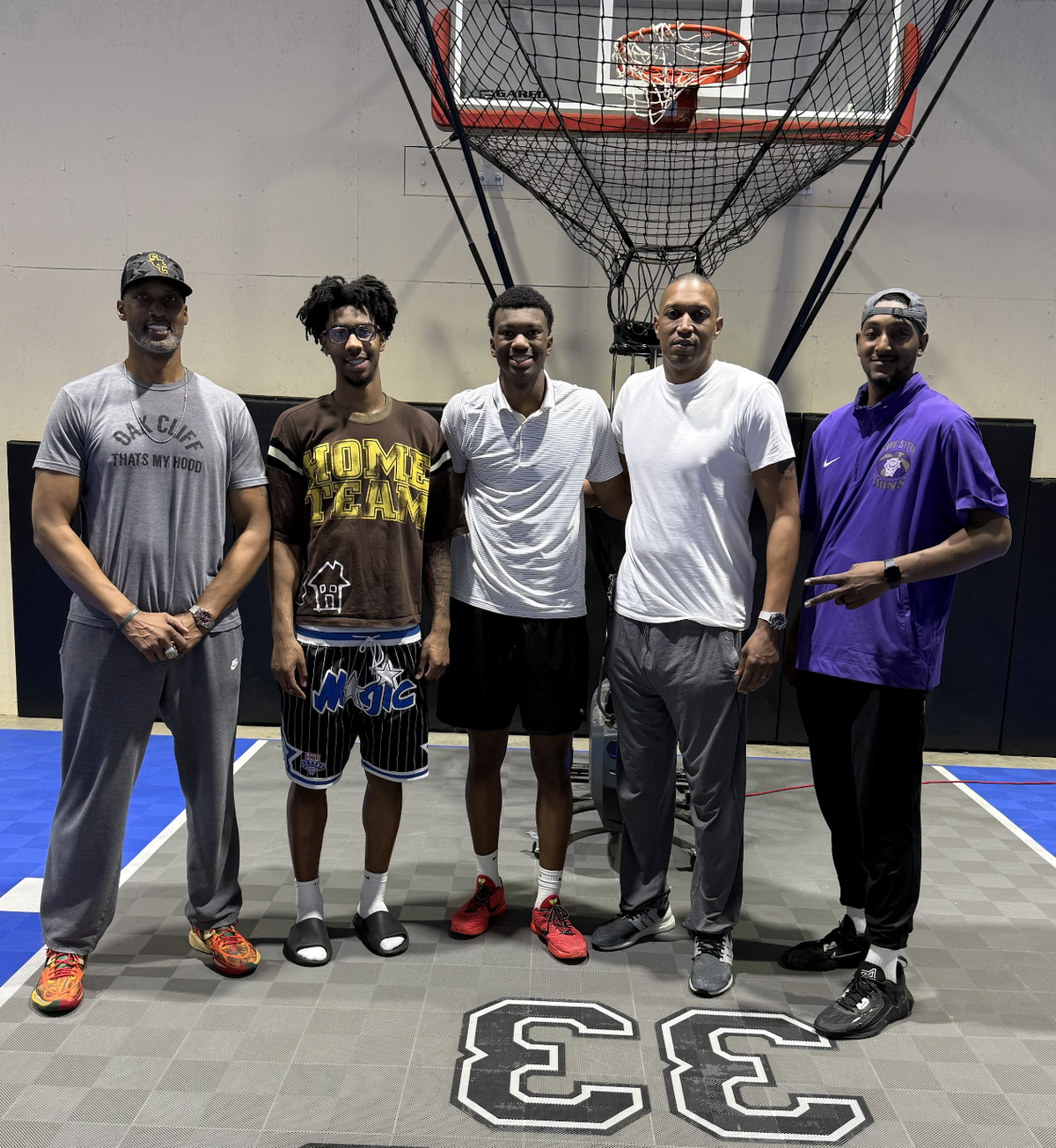 The Battie family is basketball royalty in Dallas. From left to right: Derrick Battie, Dillon Battie, Dawson Battie, Tony Battie and Chris Henson, the boys’ trainer in Dallas.