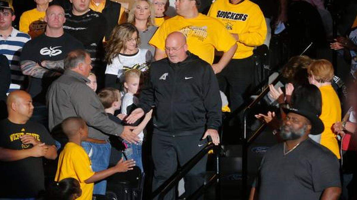 
WSU assistant coach Steve Forbes is introduced to the crowd at Koch Arena in 2013 during Shocker Madness.
