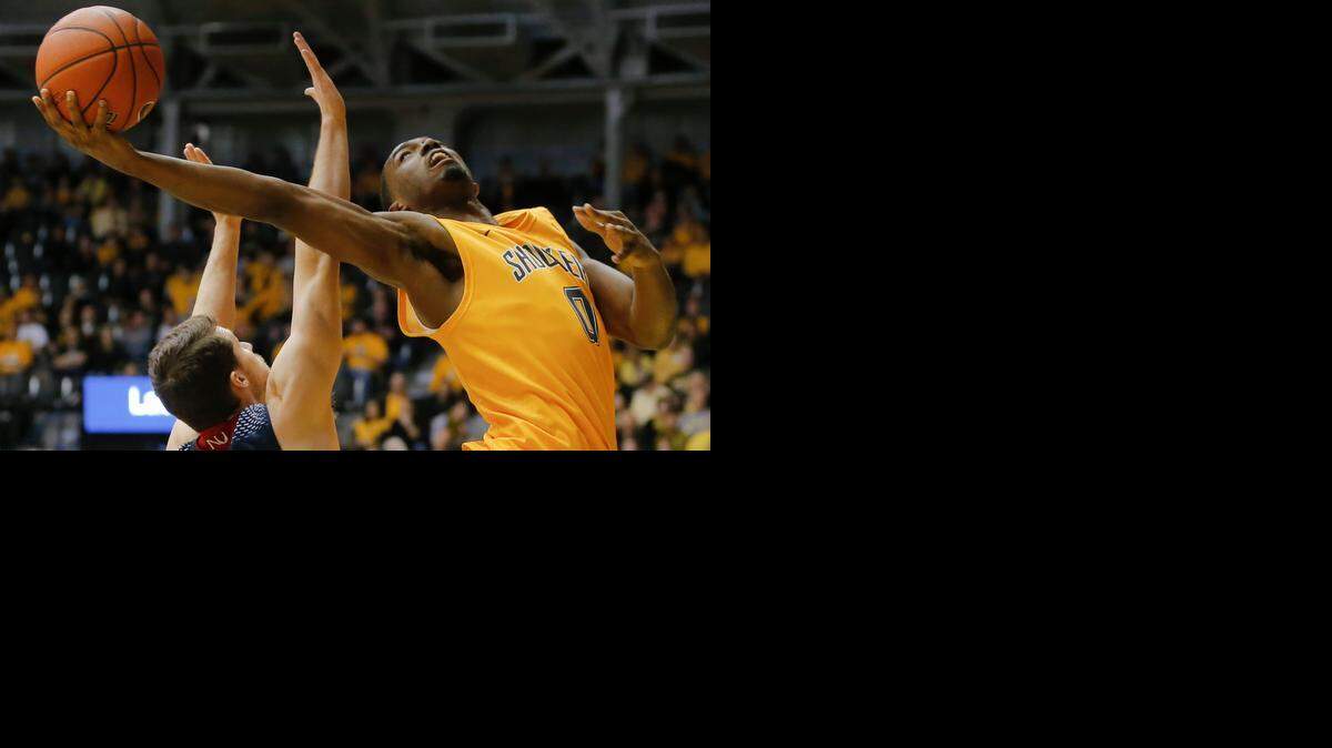 
Wichita State’s Rashard Kelly takes a shot against Newman’s Nathan Veenis during the second half of their game at Koch Arena.
