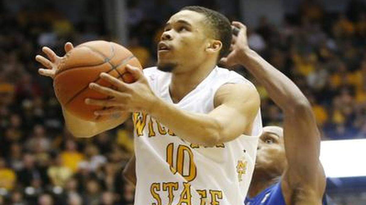 
Wichita State's Ria'n Holland shoots in the first half against Tulsa. 
